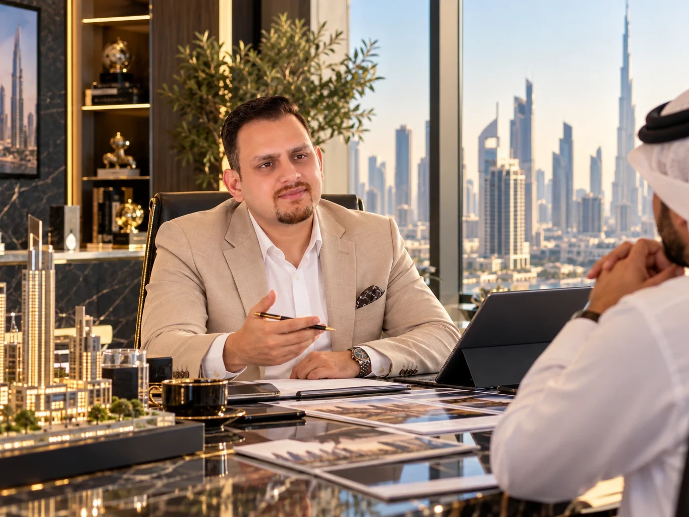 A consultant advising an investor in a Dubai office with a view of the skyline
